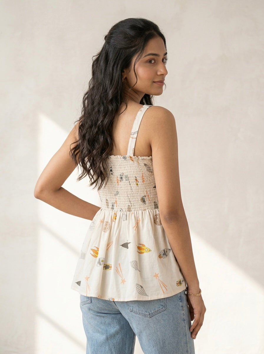 Cosmic Whimsy Smocked Peplum Top