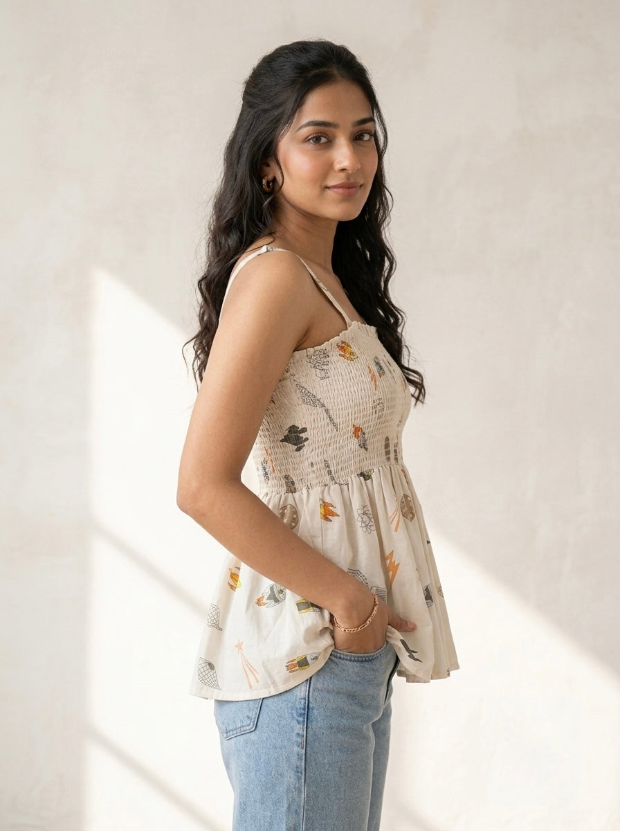Cosmic Whimsy Smocked Peplum Top