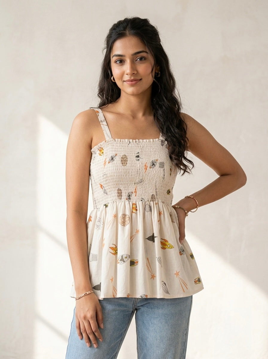 Cosmic Whimsy Smocked Peplum Top